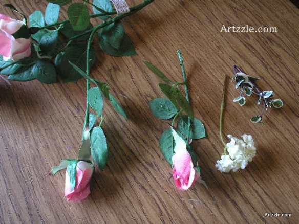 Our primary flowers are the roses, with 3 sizes of blooms on each stem. For the bouts, I've cut the smallest bud, which will be the main flower in the boutonniere. Always give your cuts as much of the stem as possible; too long is better than too short!